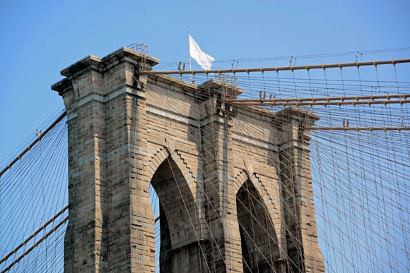 White flag atop the Brooklyn Bridge