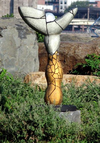 Headless sculpture in waterfront park