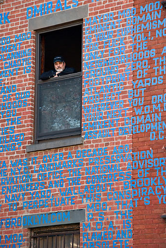 Spelling it out: Artist tapes his anti-Yards message onto buildings