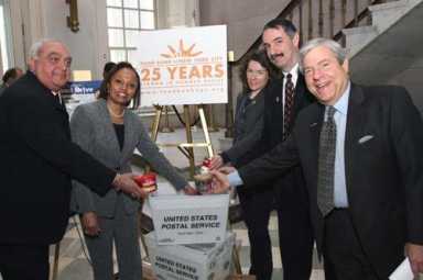 ‘Stamp’ out hunger – Postal employees food bank team up