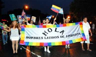 Gay pride on parade through local streets