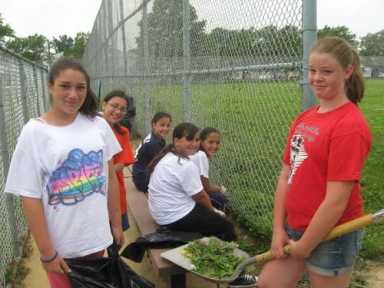 Youths pitch in for local cleanup