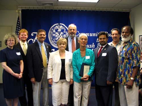 Board counts on community for clout – Community Board 14 toasts before taking break