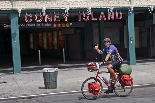 Cross-country biker rides into BK – Cyclist enjoys Nathan’s dog, Cyclone ride