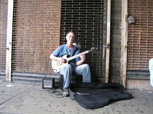 God and guitar guides this Brooklyn street musician