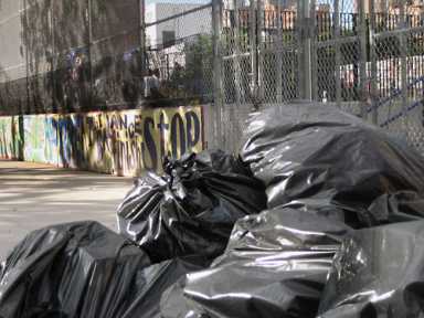 Trash war on Dean Street