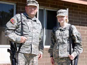A father and daughter in arms