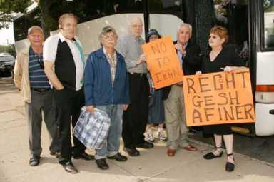 Take a walk, Mahmoud – Residents protest Iranian president’s visit to New York