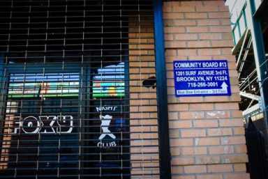 Topless girls; clueless cb13-Board, dancers share building