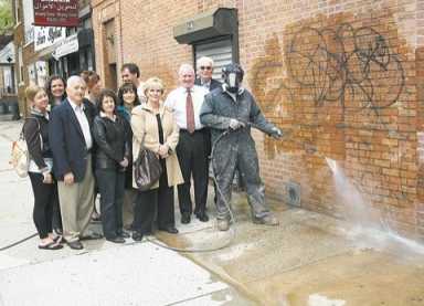 Power washed away at the intersection of 82nd Street and 5th Avenue, thanks to grimeâˆ’busters