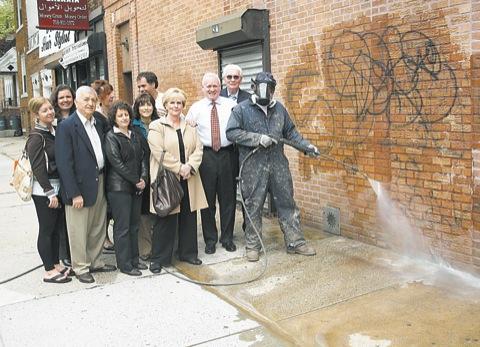 Power washed away at the intersection of 82nd Street and 5th Avenue, thanks to grimeâˆ’busters