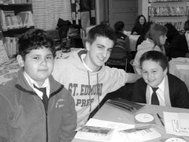 Teens teach reading to elementary school kids