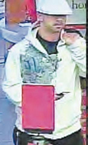 Kangol crook strikes bank