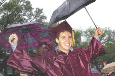 Bklyn College grads smile through the rain