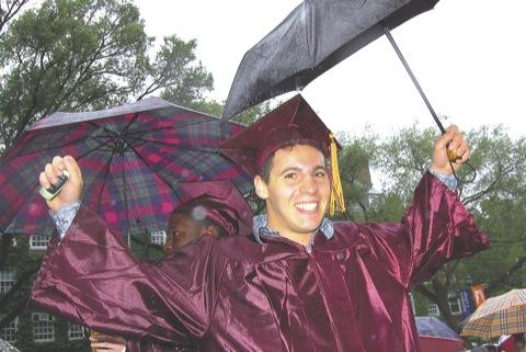 Bklyn College grads smile through the rain