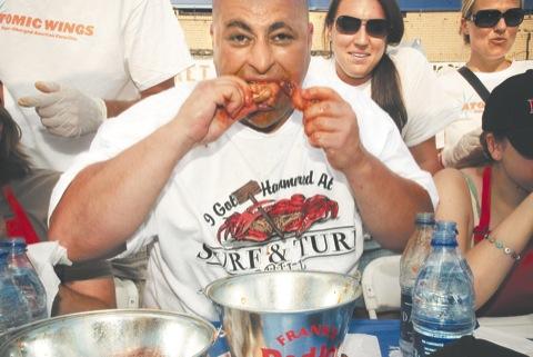 With a wing and a prayer, competitors chow down