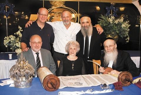 Local congregations rededicates scrolls