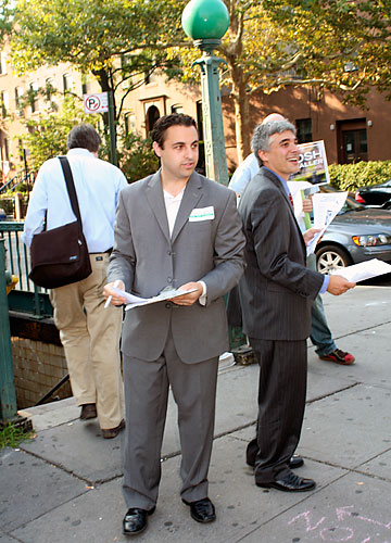 Two candidates, one subway entrance, one issue