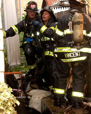 Fire threatens East 31st St. home