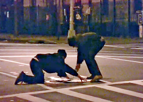Re-cyclers! Activists repaint Bedford Avenue bike lane