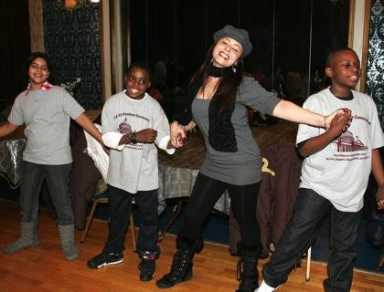 P.S. 203 student musicians play for Midwood seniors