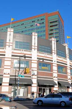 Old Glory inverted atop Ratner mall