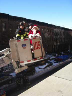 Santa Claus drops by New York Methodist Hospital for the holidays