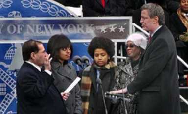 De Blasio takes office