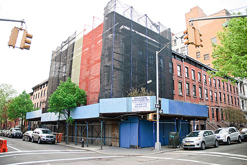 Falling down! City sues cement magnate Quadrozzi over decrepit Henry St. buildings