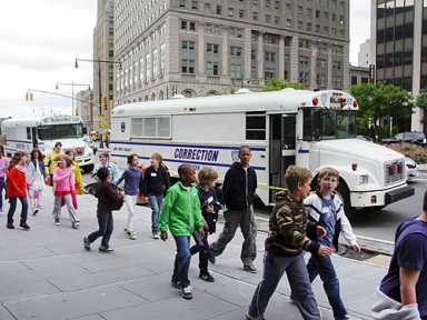 Jailhouse crock! Correction buses still parking all over Downtown