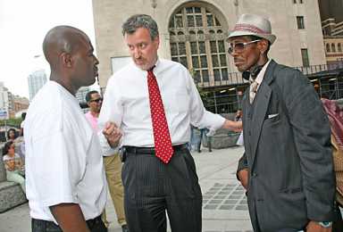 Shingle out! Bill DeBlasio plays therapist to an anxious public