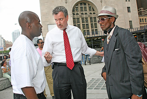 Shingle out! Bill DeBlasio plays therapist to an anxious public