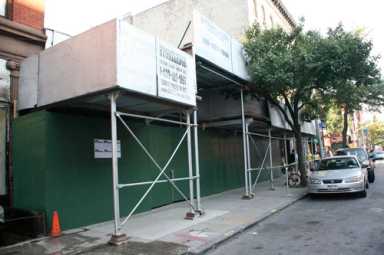 Zuzu’s ghost? Fire-gutted shops to be torn down on Seventh