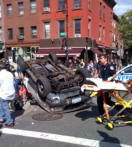 Check out this picture of an overturned car on Smith Street!