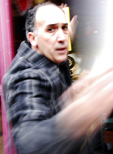 Smacked! Paper shutterbug hit on the job