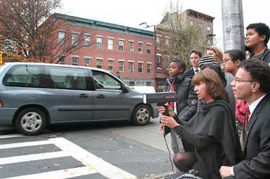 Children’s crusade! School kids aiming guns to slow down speeders on Atlantic Ave