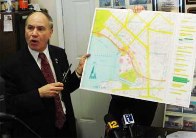Hurst pulls out big guns vs. trash site
