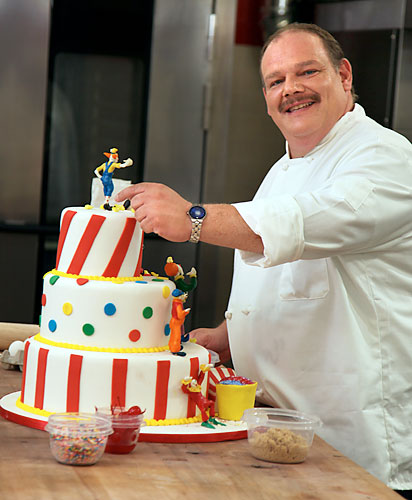 Leaning tower! TV baker’s giglio cake fell, now he’s back in Williamsburg