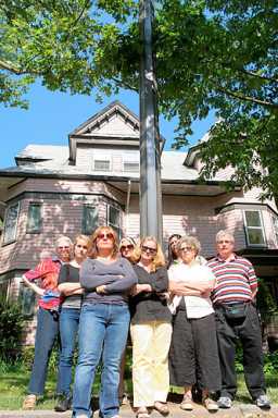 Verizon tries the grizzly bear approach to thwarting vandals — huge, ugly poles in a historic district