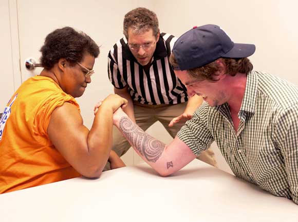 Arms race! Reporter takes on the best arm wrestlers in the borough — and loses!