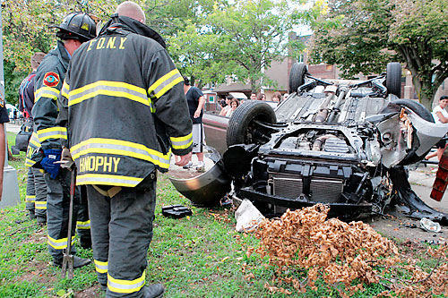 Flipped out! Car tumbles onto Ocean Parkway pedestrian median