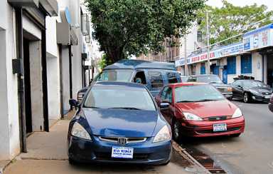 Carmageddon! Ridge dealerships block sidewalks with cars