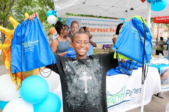 School supplyapalooza! Hundreds of kids stock up during fun-filled Harvest Fest