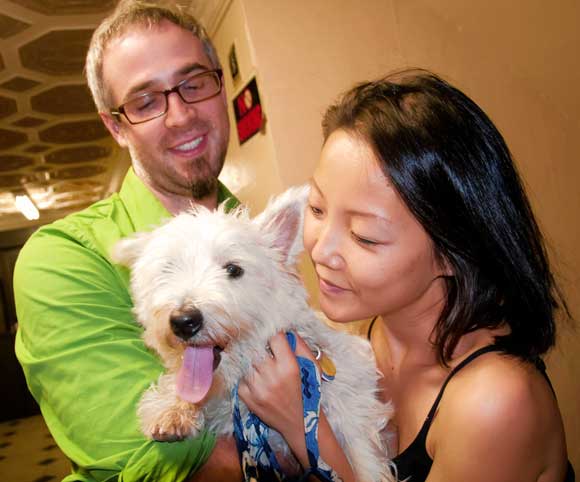 Best friends! Dognapped Winston is back where he belongs