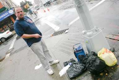 Trash war! Merchants blast city for removing garbage cans along 18th Avenue