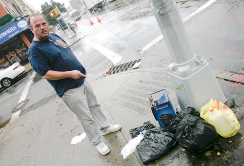 Trash war! Merchants blast city for removing garbage cans along 18th Avenue