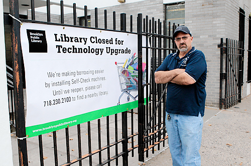 Sign-mon says: Library placard has bookworms confused