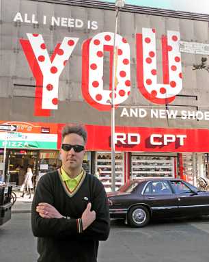 Powers of Love! Artist paints more letters across Downtown walls