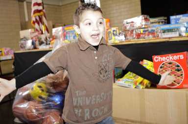 A holly jolly affair: 94th Precinct cops bring Santa to Williamsburg