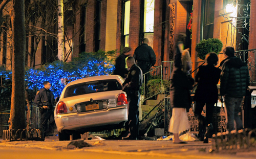 Hit and run: Shot cabbie collides with Heights brownstone